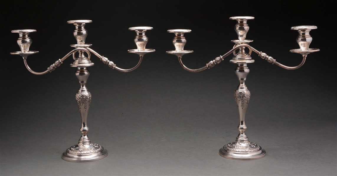 PAIR OF STERLING SILVER THREE-CANDLE HOLDER CANDLEABRAS.