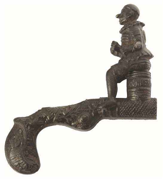 SCARCE LATE 19TH CENTURY CAST-IRON CLOWN ON BARREL CAP GUN.