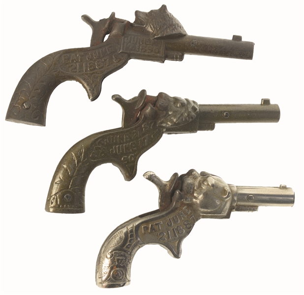 LOT OF 3: LATE 19TH CENTURY SCARCE FIGURAL CAP GUNS.