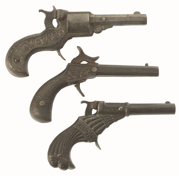 LOT OF 3: SCARCE LATE 19TH CENTURY CAST-IRON CAP GUNS.