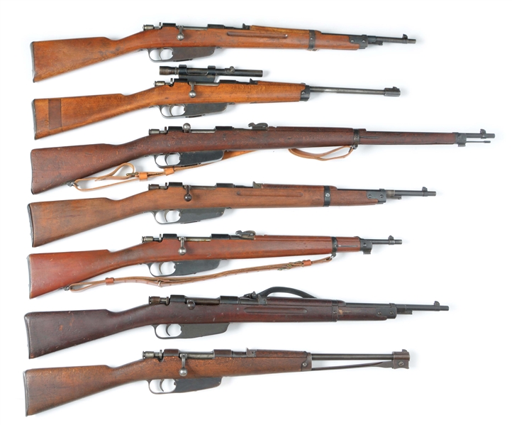 (C) LOT OF 7: CARCANO BOLT ACTION CARBINES AND RIFLE.