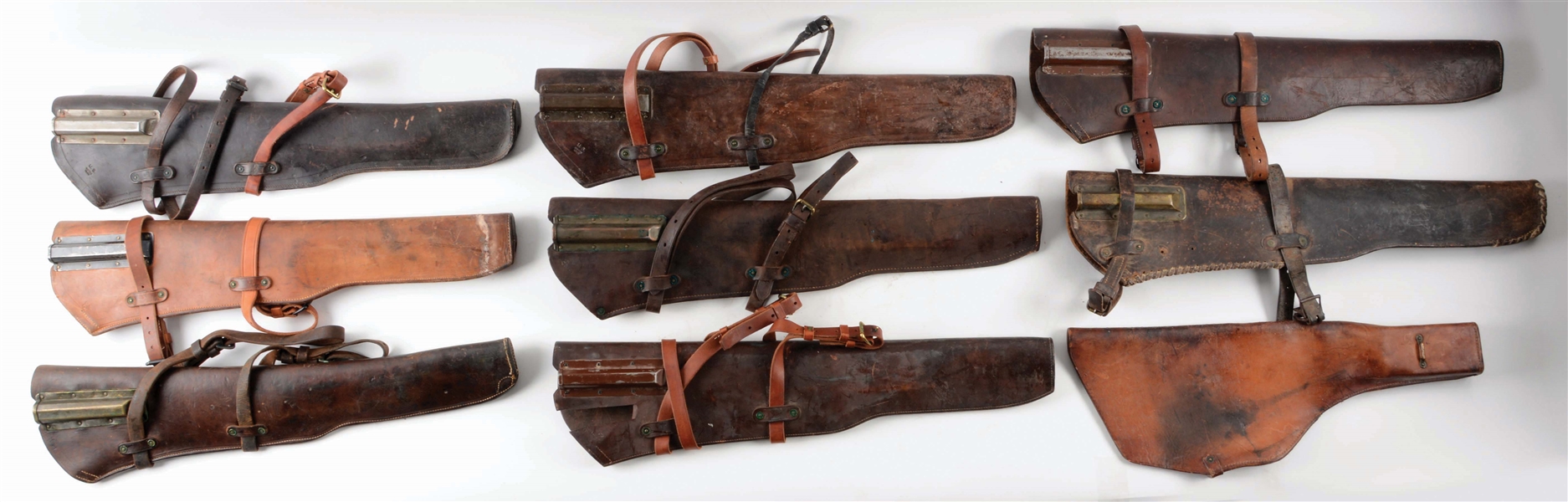 LOT OF 9: US ARMY LEATHER RIFLE SCABBARDS.