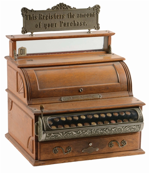 UNIVERSAL CASH REGISTER WITH ORIGINAL PEGGED TOP SIGN.