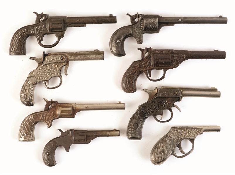 LOT OF 8: LATE 19TH CENTURY - EARLY 20TH CENTURY CAST-IRON CAP GUNS AND BLANK GUNS.