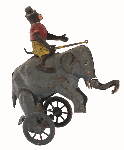 GERMAN HAND-PAINTED WIND-UP MONKEY RIDING ELEPHANT TOY.