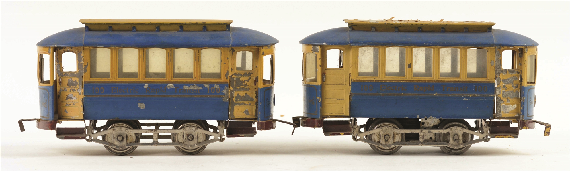 LOT OF 2: LIONEL NO. 100 ELECTRIC RAPID TRANSIT TROLLEY & TRAILER.