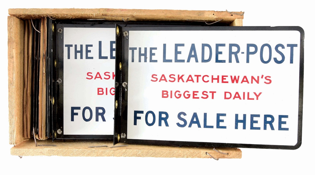 LOT OF 22: LEADER POST NEWSPAPER FOR SALE HERE TIN & PORCELAIN FLANGE SIGNS IN ORIGINAL SHIPPING CRATE. 