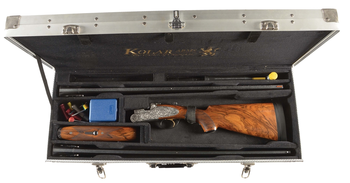(M) P. BERETTA OVER UNDER SHOTGUN WITH CASE AND EXTRA BARRELS.