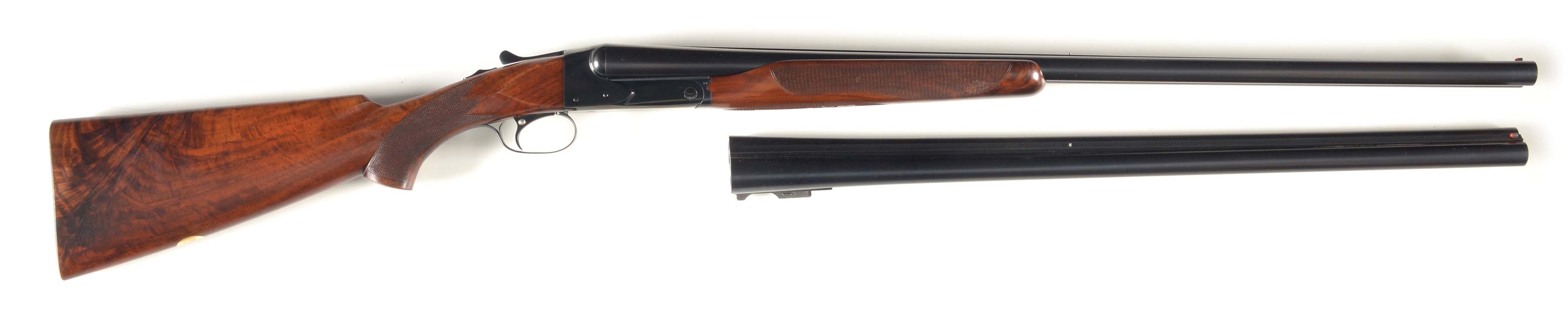 (C) WINCHESTER MODEL 21 SIDE BY SIDE 12 BORE SHOTGUN WITH EXTRA BARREL.