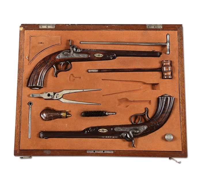 (A) A VERY FINE EXHIBITION QUALITY CASED SET OF GERMAN PERCUSSION SINGLE SHOT TARGET PISTOLS BY EDUARD KETTNER, 1865-1906, WORKED IN COLOGNE AND SUHL.