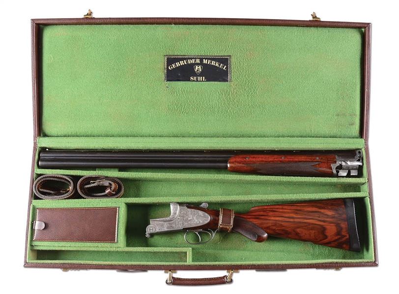 (C) MERKEL MODEL 203E OVER-UNDER SIDELOCK EJECTOR SHOTGUN WITH RELIEF GAME SCENE ENGRAVING AND CASE.