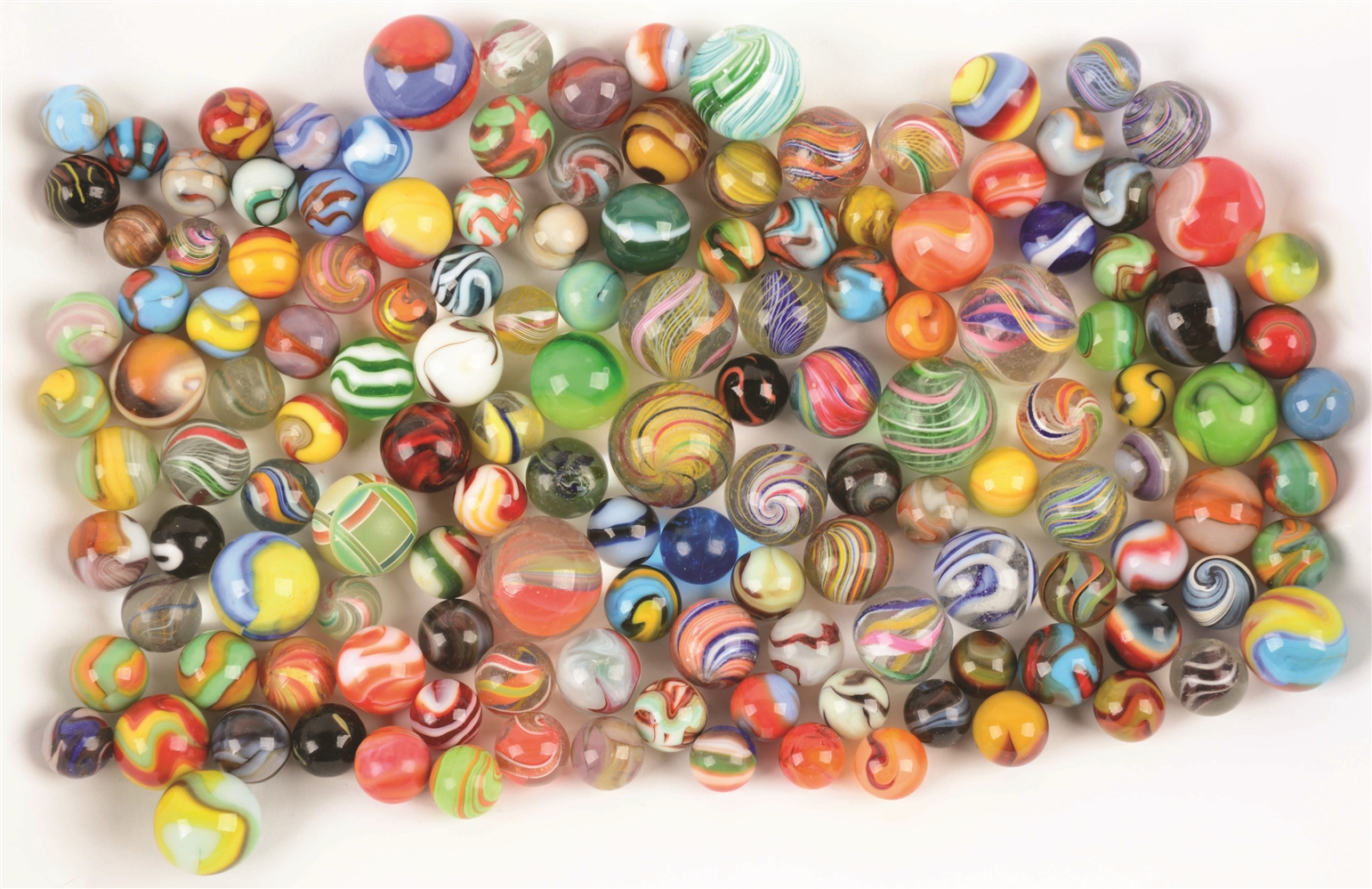 LARGE ASSORTMENT OF HANDMADE AND MACHINE MADE MARBLES.