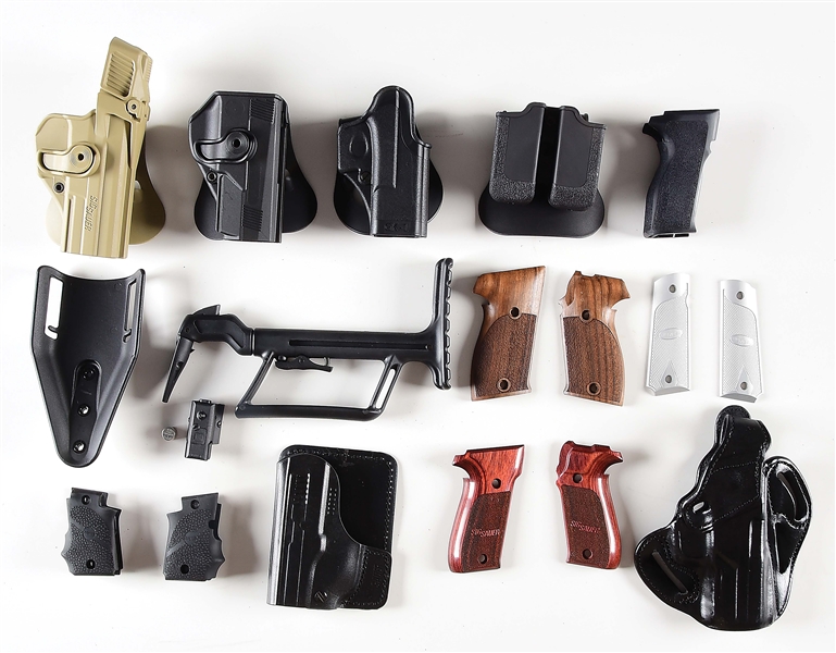 LARGE LOT OF OEM ACCESSORIES INCLUDING LASERS, GRIPS, HOLSTERS.