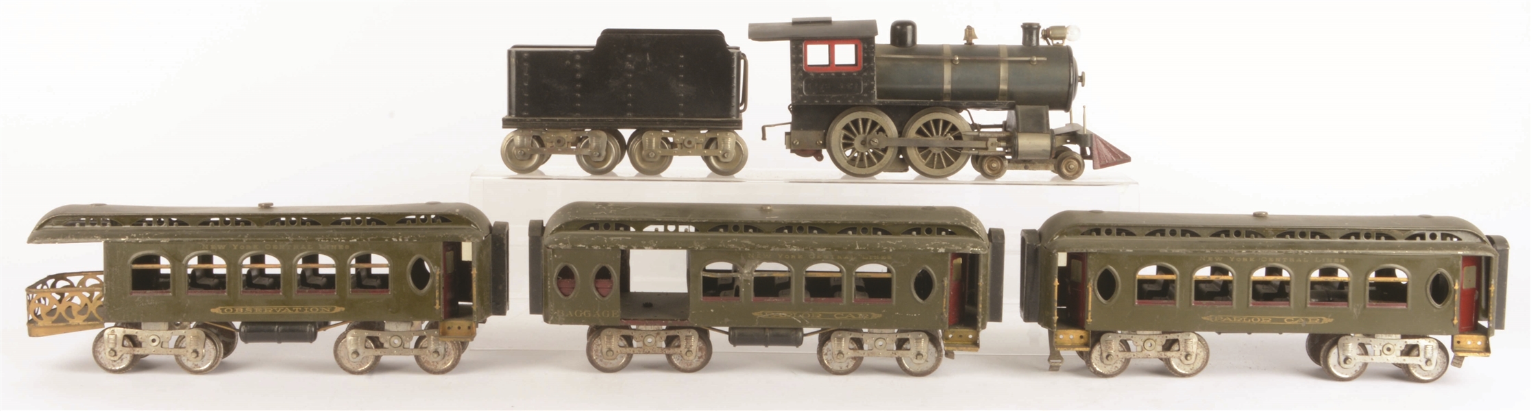 LIONEL NO. 6 WITH THREE PASSENGER CARS.