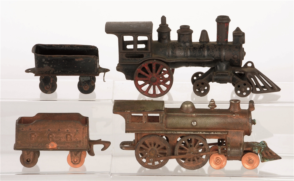 LOT OF 4: TWO-PIECE TWO LOCOMOTIVES & TENDER CAST-IRON FLOOR TOYS BY HARRIS AND HUBLEY.