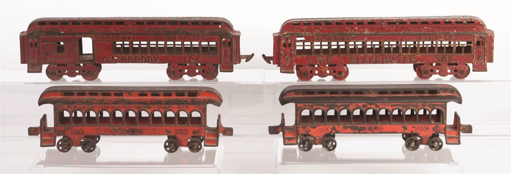 LOT OF 4: CAST-IRON PASSENGER CARS BY HARRIS AND GREY IRON.