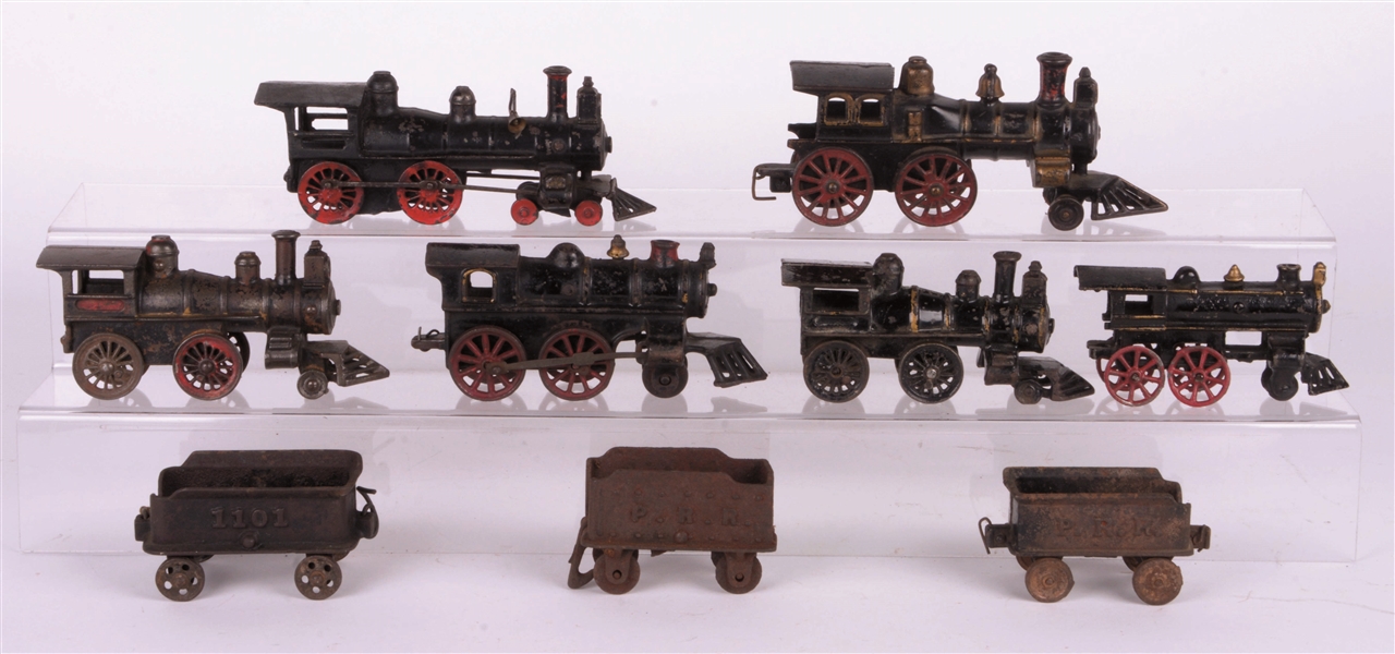 ASSORTMENT OF STEAM LOCOMOTIVES WITH SOME TENDERS.