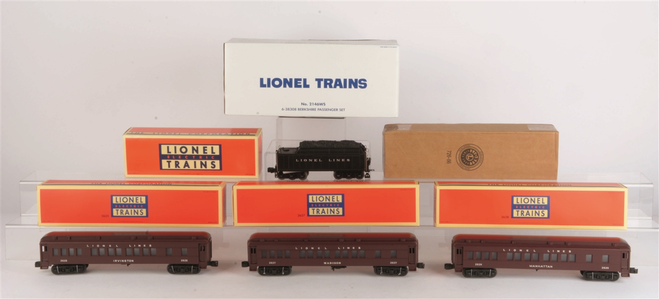 LARGE LOT OF LIONEL TRAINS WITH BOXES.