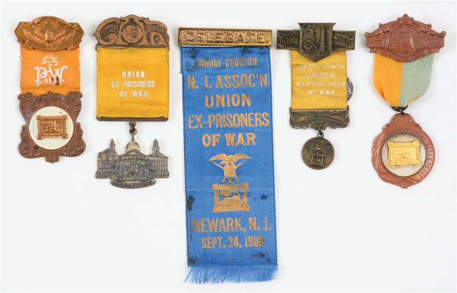 LOT OF 5: UNION EX-PRISONERS OF WAR MEDALS AND RIBBON.