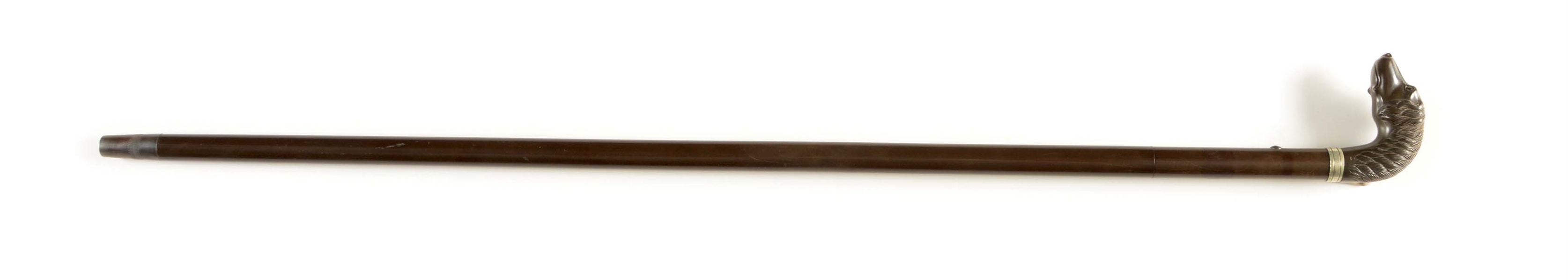 (A) A SCARCE AND SOUGHT AFTER LARGE DOG HEAD REMINGTON RIFLE CANE IN UNDAMAGED CONDITION THROUGHOUT.