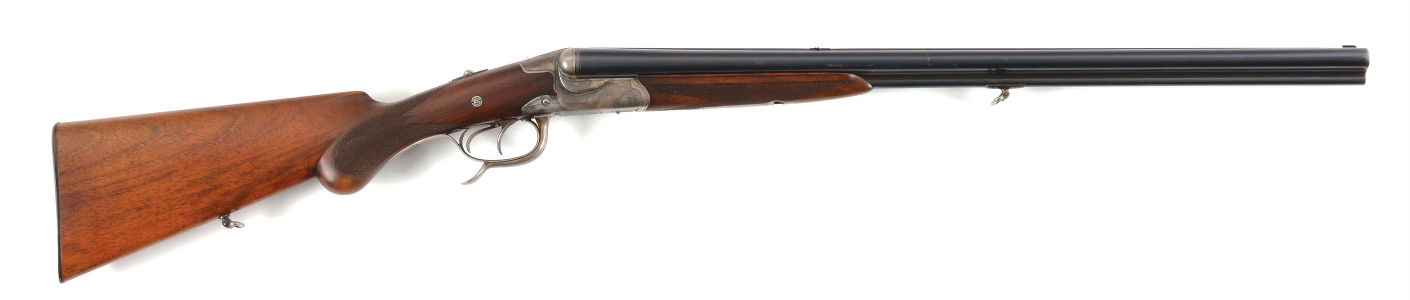 (C) FRED ADOLPH DRILLING SIDE BY SIDE SHOTGUN.