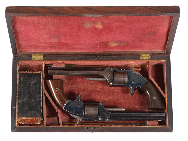 (A) CASED PRESENTATION PAIR OF SMITH AND WESSON NO 2 ARMY REVOLVERS.