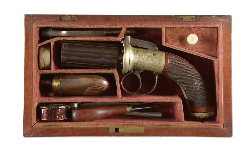 (A) A GOOD CASED ENGLISH PERCUSSION PEPPERBOX WITH GERMAN SILVER FRAME AND INTEGRAL LION MASK BUTT.