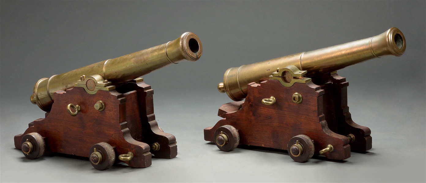 (A) A FANTASTIC PAIR OF FRENCH MODEL 1786 STYLE 2 - 1/2 POUNDER BRONZE NAVAL GUNS ON WHAT APPEAR  TO BE PERIOD MAHOGANY BRASS BOUND CARRIAGES.