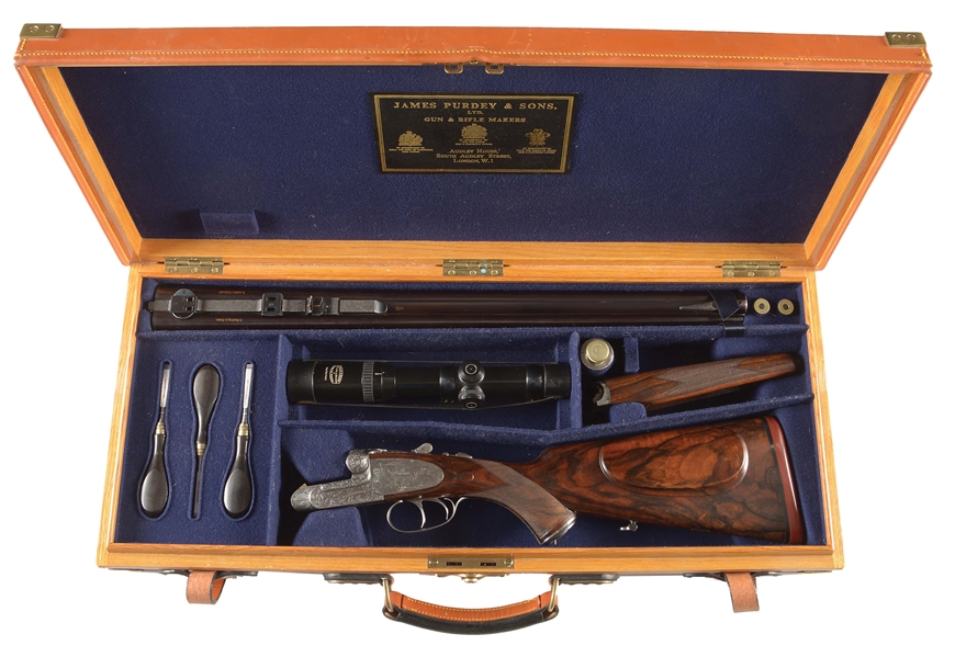 (M) JAMES PURDEY SIDELOCK EJECTOR DANGEROUS GAME (.470 NE) DOUBLE RIFLE WITH SUPERB RELIEF ENGRAVING AND FINE BULINO GAME SCENES BY STEPHEN KELLEY WITH SCHMIDT & BENDER SCOPE, CASE, AND ACCESSORIES. 