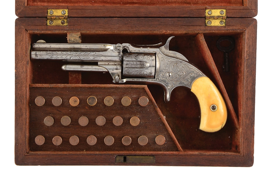(A) CASED ENGRAVED SMITH & WESSON REVOLVER.