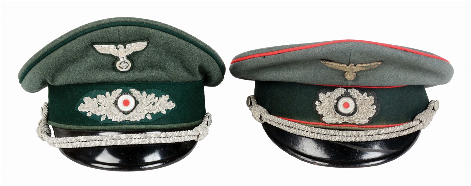 LOT OF 2: GERMAN WORLD WAR II HEER OFFICER VISOR CAPS.