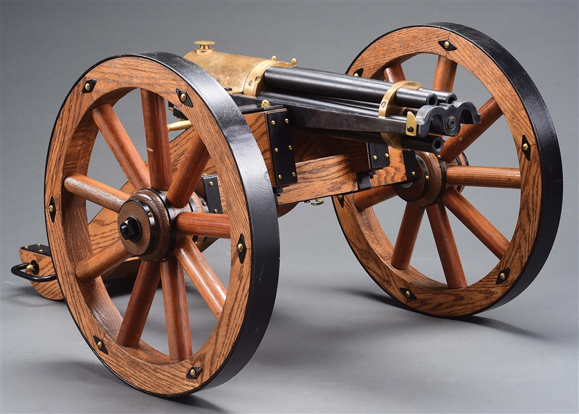 (M) MIKE SUCHKA REDUCED SIZE WORKING REPRODUCTION MODEL 1887 HOTCHKISS REVOLVING CANNON IN .45-70 WITH ACCOMPANYING LIMBER WAGON AND AMMUNITION CHEST.