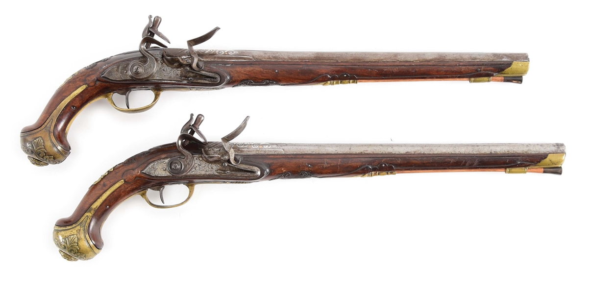 (A) A REMARKABLE AND MONUMENTAL PAIR OF 18TH CENTURY CONTINENTAL FLINTLOCK BRONZE MOUNTED HOLSTER PISTOLS.