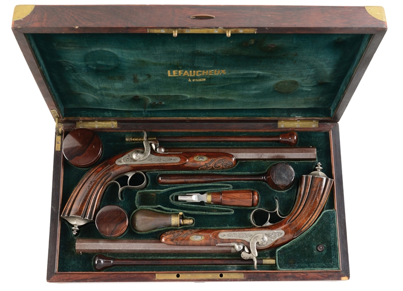(A) AN ATTRACTIVE CASED PAIR OF LEFAUCHEUX PERCUSSION PISTOLS.