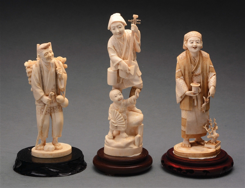 THREE CARVED IVORY FIGURES OF A GARDNER, TRAVELER AND MINSTREL WITH SMALL CHILD.
