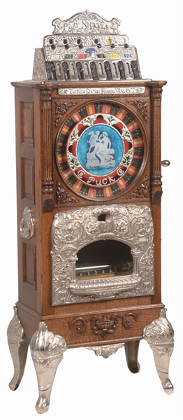5¢ CAILLE BROTHERS "PUCK" MUSICAL SLOT MACHINE.