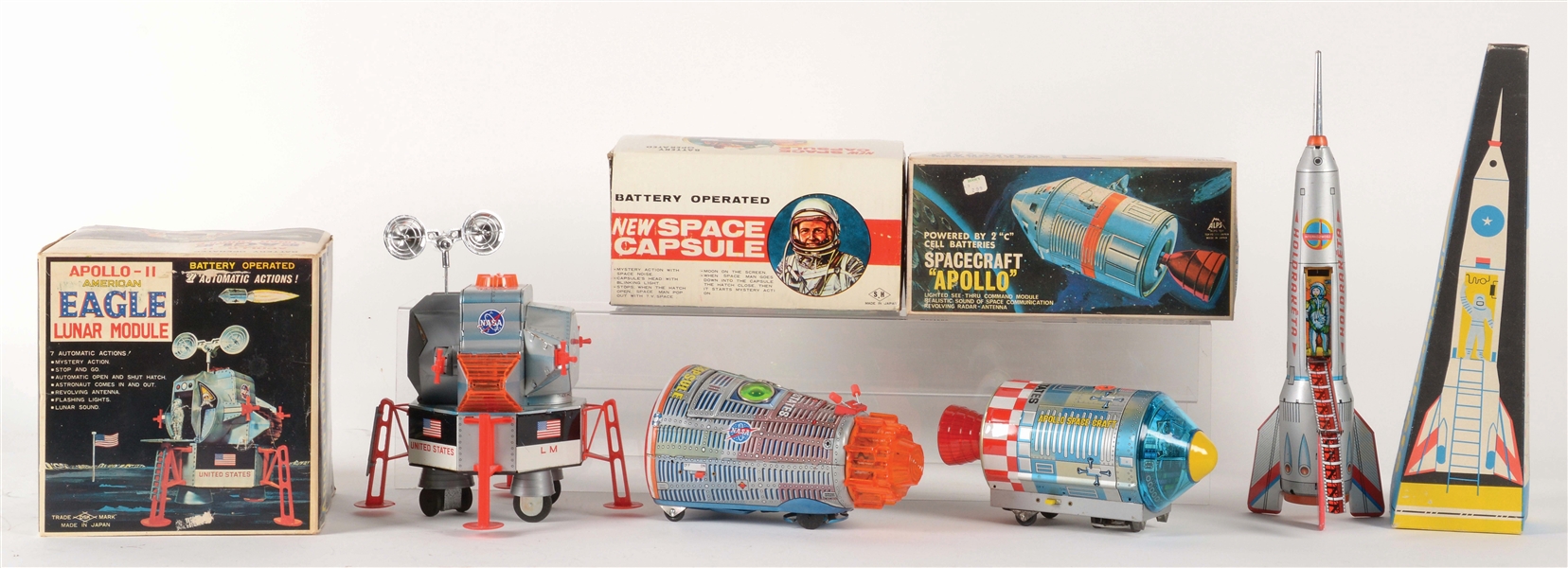 LOT OF 4: FOREIGN MADE BATTERY-OPERATED AND FRICTION SPACE VEHICLES.