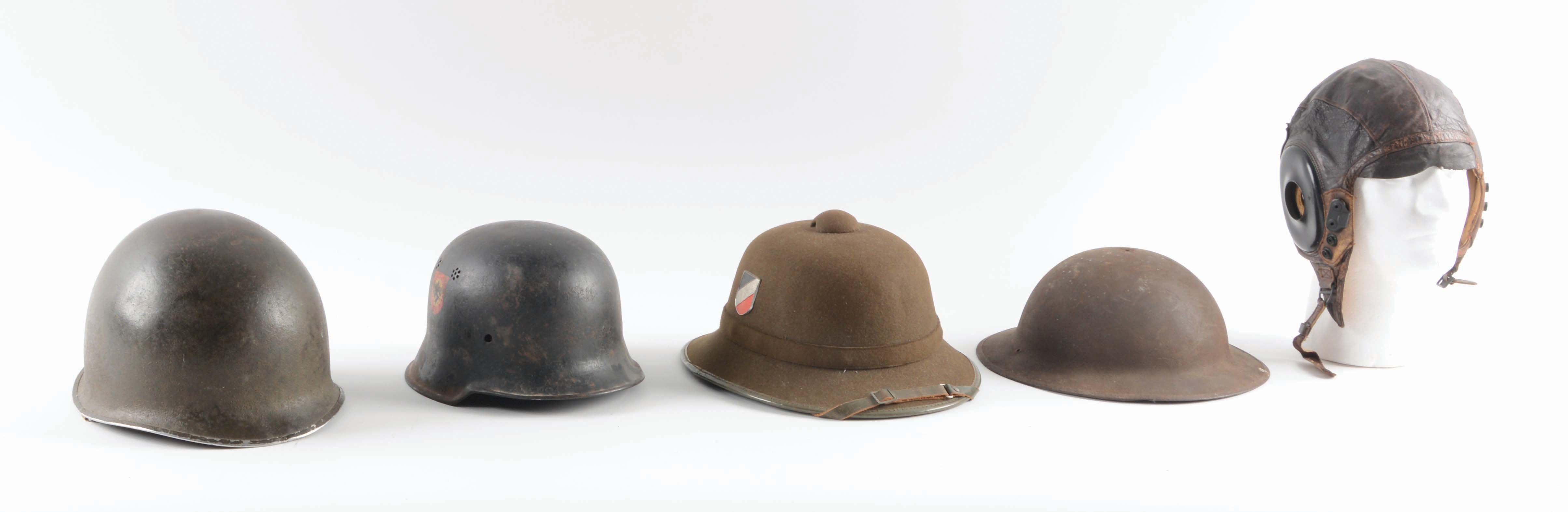 Lot Detail - LOT OF 5: PIECES OF WORLD WAR II HEADGEAR.