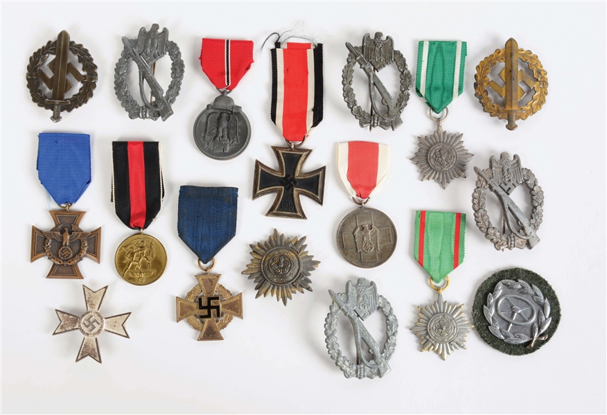 LOT OF 17: MISCELLANEOUS GERMAN WORLD WAR II AWARDS AND COMBAT BADGES.