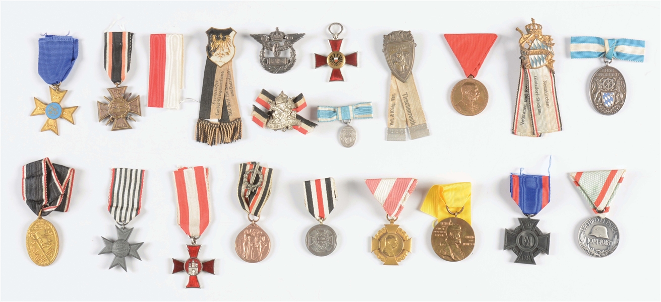 LOT OF 20: MISCELLANEOUS IMPERIAL GERMAN MILITARY AWARDS AND INSIGNIA.