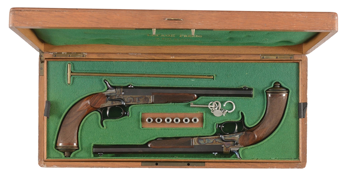 (A) CASED PAIR OF LE PAGE WAX BULLET DUELLING PISTOLS.
