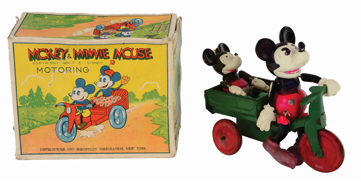CELLULOID WIND-UP WALT DISNEY MICKEY MOUSE AND MINNIE MOTORING WITH ORIGINAL BOX.