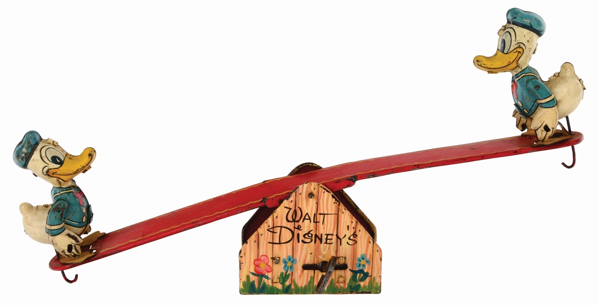 MARX TIN-LITHO AND HAND-PAINTED WALT DISNEY DONALD DUCK SEESAW PROTOTYPE TOY.