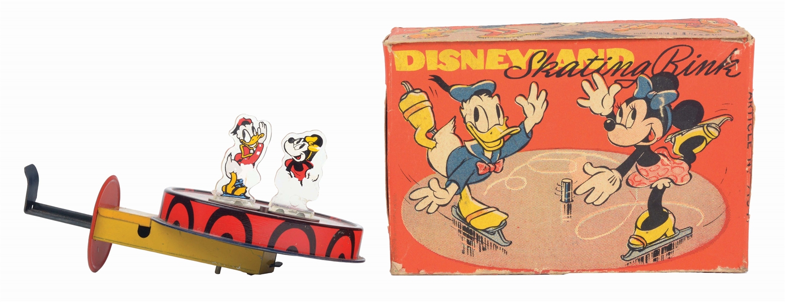 ENGLISH METTOY DISNEYLAND MICKEY MOUSE AND DONALD DUCK SKATING RINK TOY IN ORIGINAL BOX.
