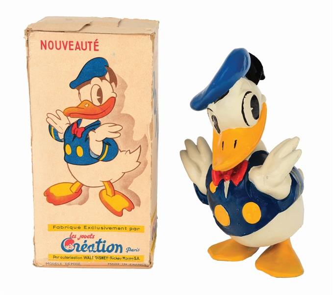 FRENCH MECHANICAL COMPOSITION WALT DISNEY DONALD DUCK WALKING TOY.