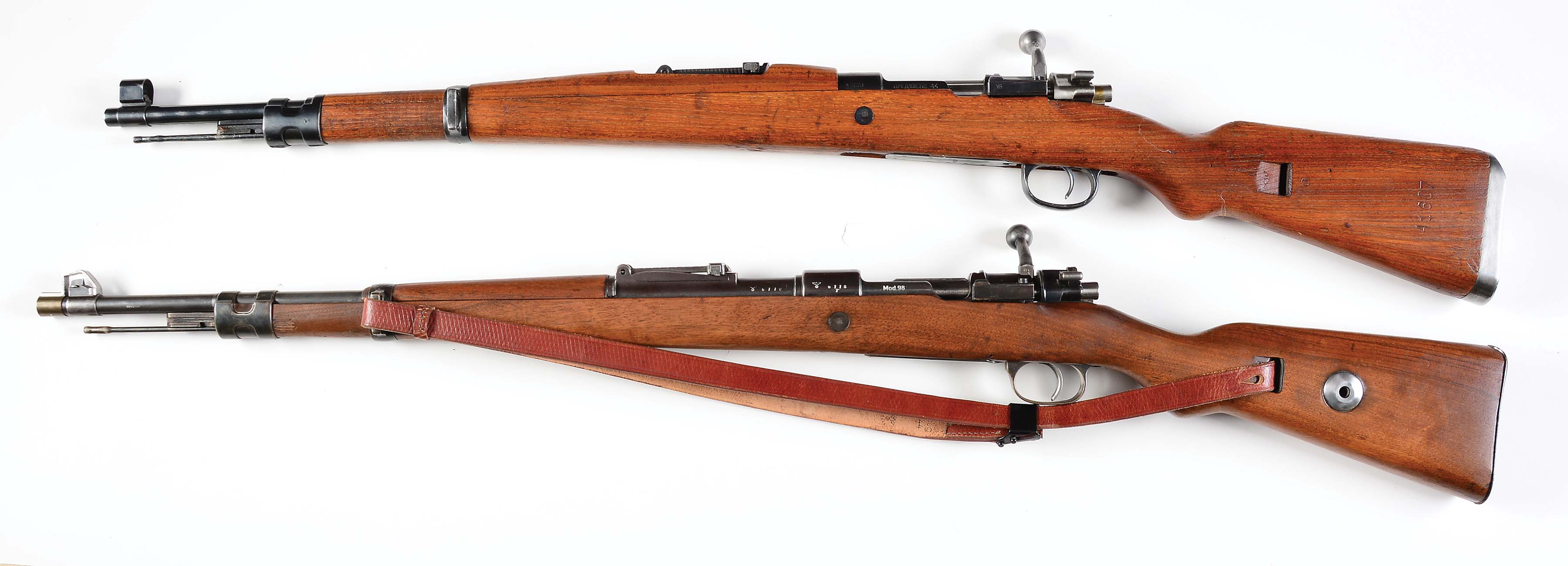 C) lot of two:two mauser 8MM bolt action military rifles. 