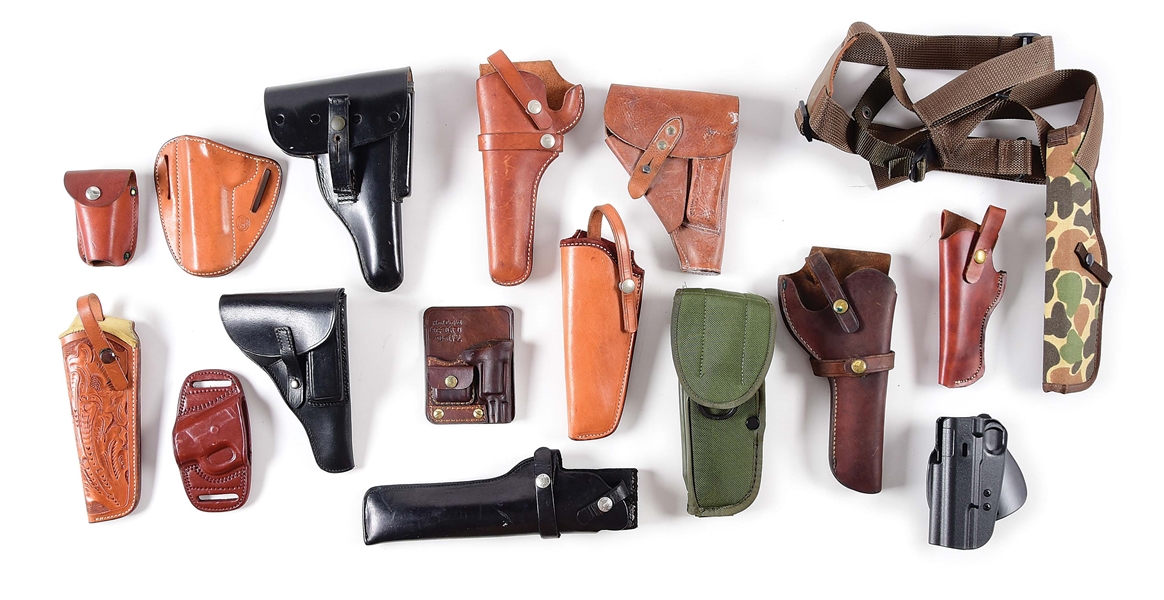 LARGE LOT OF HOLSTERS.