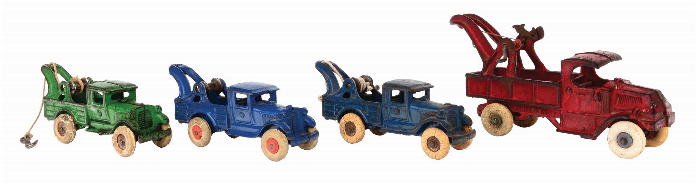 LOT OF 4: CAST-IRON AMERICAN MADE TOW TRUCKS.
