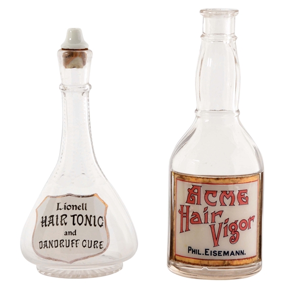 LOT OF 2: LABEL UNDER GLASS BARBER BOTTLES.