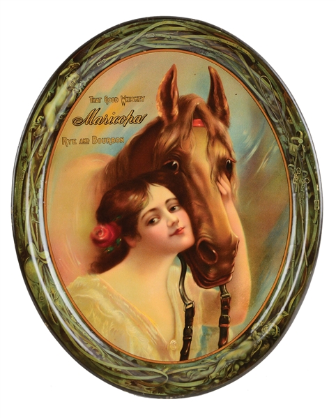 OVAL SELF-FRAMED TIN SIGN ADVERTISING MARICOPA RYE AND BOURBON.